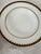 Fritz & Floyd "Taos" Dinnerware set of 16. Black and white with gold zig zag pattern around rim. Fine Porcelain stamped...