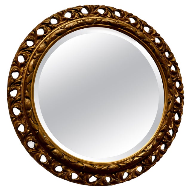 Carved Bevelled Gilt Round Wall Mirror, 1920 For Sale