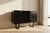 An authentic mid-century cabinet designed by George Nelson for Herman Miller￼, circa 1950s. This piece features a clean...