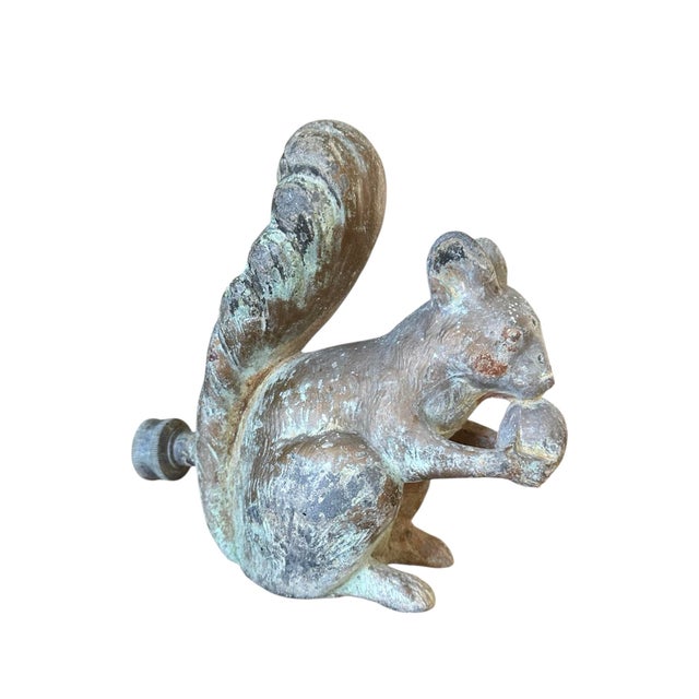 A charming, vintage garden sprinkler. Features a cast metal, squirrel form garden sprinkler in a patinated bronze/brass...