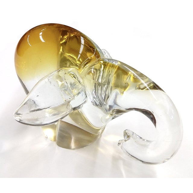 This is unique and eye-catching decorative item that combines natural beauty with sparkling crystal elements. Its warm,...