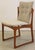This set of four Danish dining room chairs radiates the timeless elegance of the Mid Century Modern Design. Made from warm...
