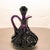 This mid century pressed glass cruet features the classic Moon and Star pattern, a historic American glass design first...