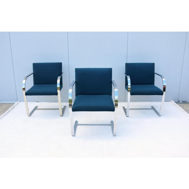 Fabulous set of three Brno flat bar armchairs in colonial blue fabric by Gordon International. An icon of Modernist...