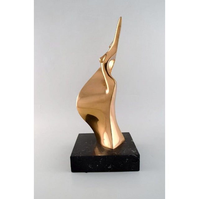 Tony Morey for Italica, Spain. Large modernist female sculpture in bronze on a marble base. Late 20th century. Measures:...