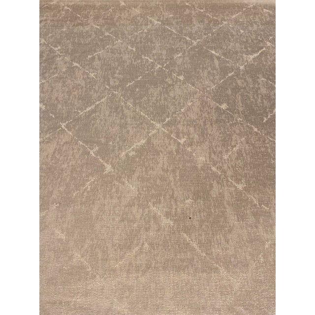 This chic modern fabric an organic modern Dimond print. It is a champagne sateen with a metallic thread. Its hand is soft...