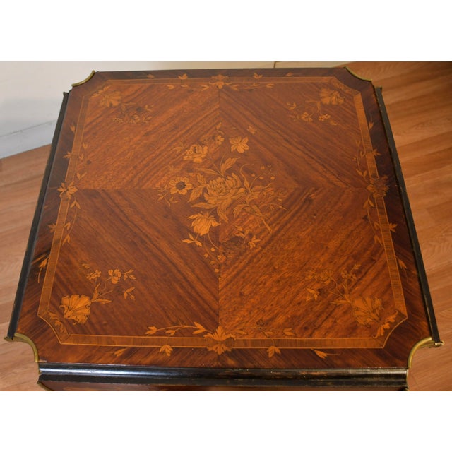 We are pleased to offer this beautiful Antique French Louis XV table, from the 1920s. This table is made of Walnut &...