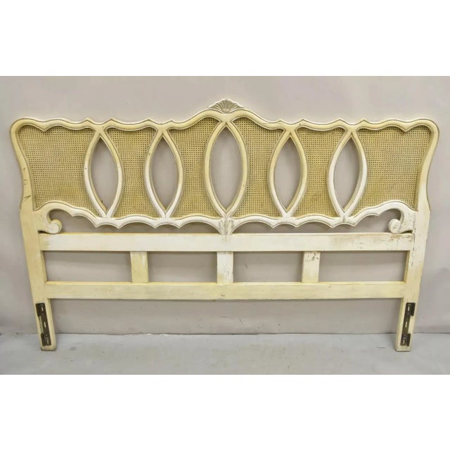 Vintage French Provincial Hollywood Regency Cream Painted Cane Panel King Size Bed Headboard. Circa Mid 20th Century....