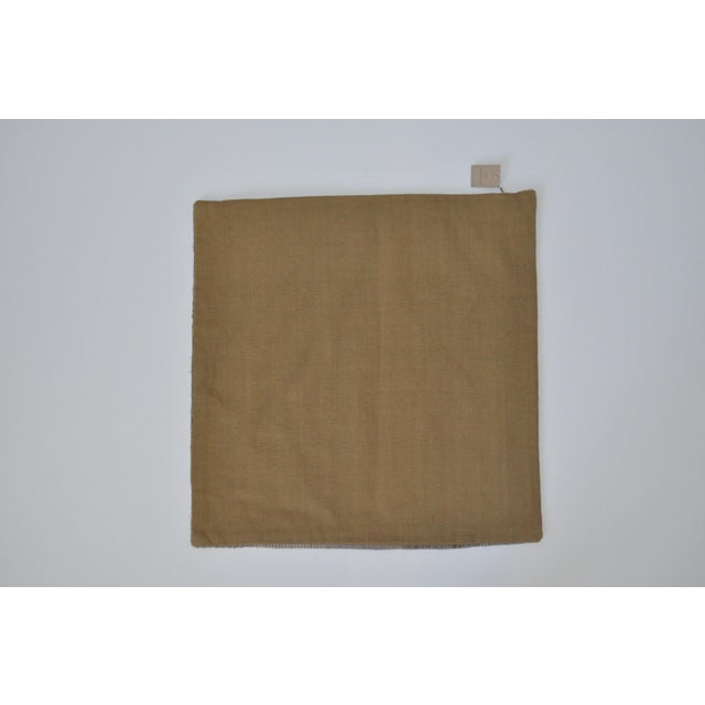 Introduce a touch of sophistication to your home with our luxurious linen, silk, and cotton pillow, crafted in India....