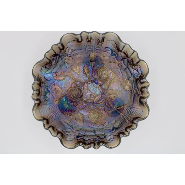 Lovely amethyst carnival glass footed bowl with ruffle edges and rose pattern. Made by Imperial Glass, overlapping IG on...