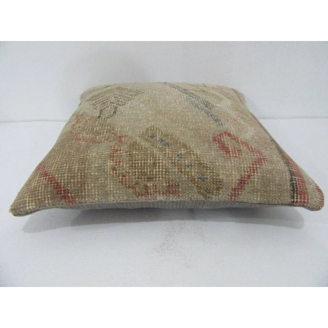 Decorative pillow cover made from a vintage Turkish handknotted rug. Backed with good quality cotton fabric. Pillow...