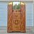 This is a gorgeous art deco era waterfall armoire that could be used as a hall foyer coat closet or for bedroom clothes...