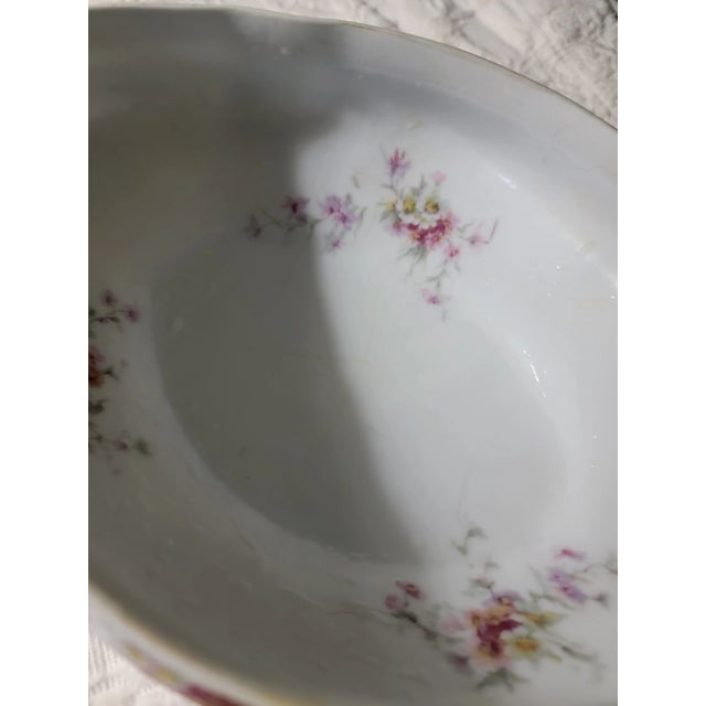 A very useful antique Victorian Flo Blue covered serving bowl and a ceramic dish of just the right proportions I have used...