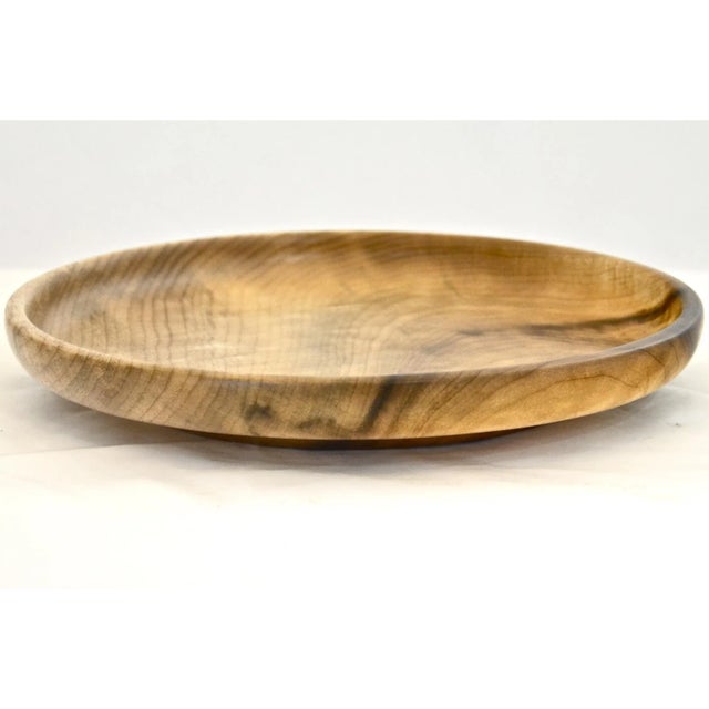 Round hand turned wood tray or catchall in a light natural finish to enhance the texture and grain. Would work well as...