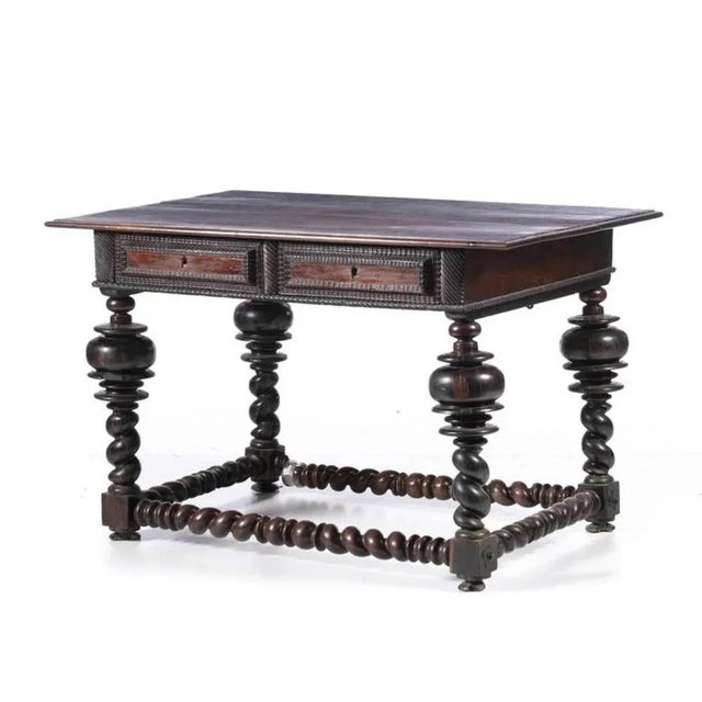 Portuguese buffet table 17th century Shivered friezes, in rosewood wood with two drawers. Sits on toned legs. Dimension:...