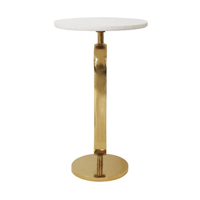 New special order item. Not vintage. The Maura Round Side Table is constructed of polished brass and white marble. Its...