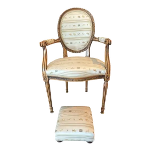 Early 1900s French Louis XVI Style Carved Walnut Fauteuil Fireside Armchair and Matching Ottoman