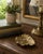 A beautifully cast brass rhubarb leaf dish by Virginia Metalcrafters, modeled with deep naturalistic veining, softly...