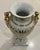 Gorgeous vintage campana porcelain urn with beautiful gold detail. It has female figural handles in gold. This would make...