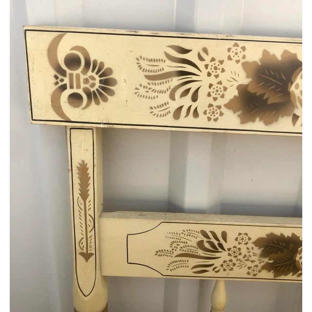 These are two adorable shabby chic Hitchcock headboards in yellow. They feature the traditional stenciled motifs with...