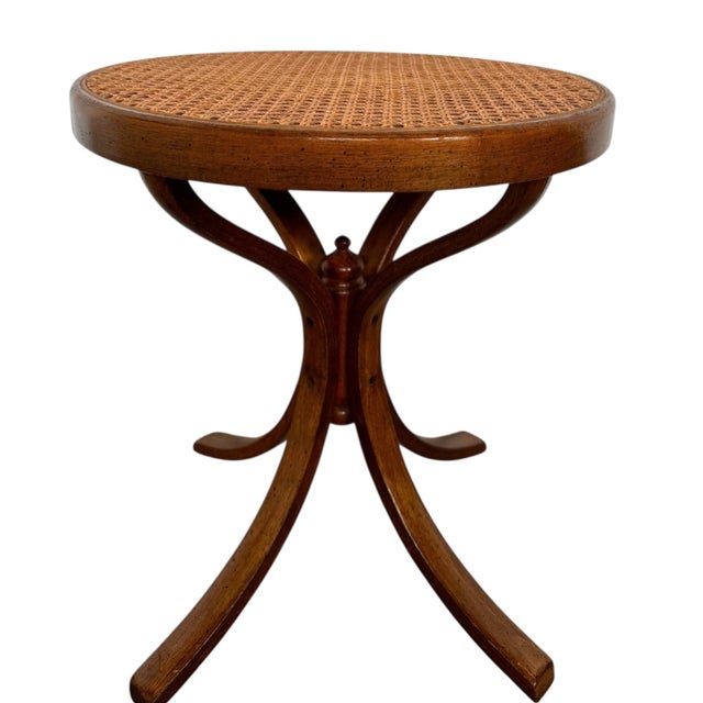 17 3/4”Diam x 19 3/4”H. Base: 19”W x 19”D Discover timeless sophistication with this exquisite Thonet-style martini table,...