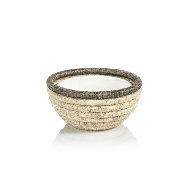 Creating beautiful presentation for your favorite condiments, our hand-woven bowl brings natural beauty and texture to the...