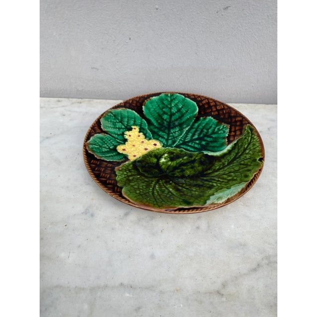 French Majolica leaves and yellow flowers plate Clairefontaine, circa 1890.