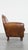 Round Cowhide Armchair with Decorative Nails For Sale - Image 3 of 14