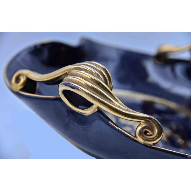 Blue gilded tray is an design object realized in the 1930s in Italy Cobalt and gold enamel, with gold trim and flower...