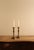 A refined pair of 19th-century French candlesticks in beautifully fluted brass, showcasing elegant vertical detailing and...