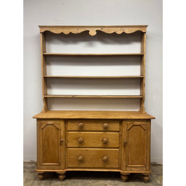 There is a particular honesty to an English pine dresser. These were not pieces made to sit untouched in formal rooms;...