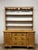 There is a particular honesty to an English pine dresser. These were not pieces made to sit untouched in formal rooms;...