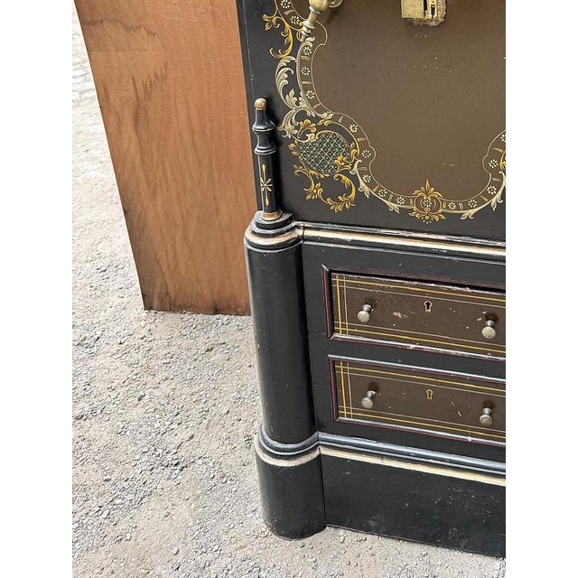 Safe. Portuguese, 20th century; made of iron, wood and other materials. Painted decoration with one door and two drawers....