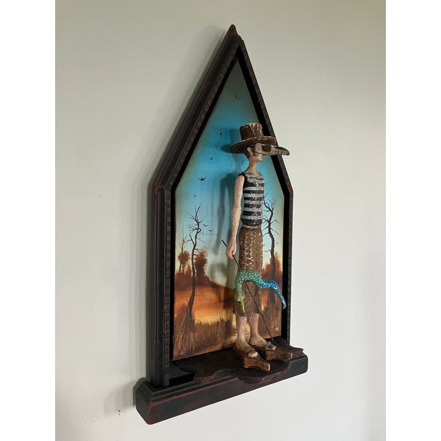 This is a gothic revival piece carved by hand in the medieval style depicting a man hunting eel. The reverse reads “If I...