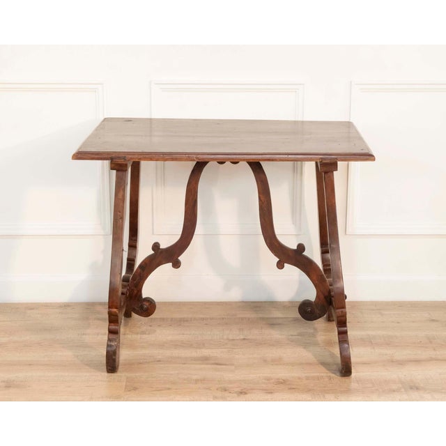 This Italian fratino table dates to the 18th century and exemplifies the restrained elegance and sculptural strength...