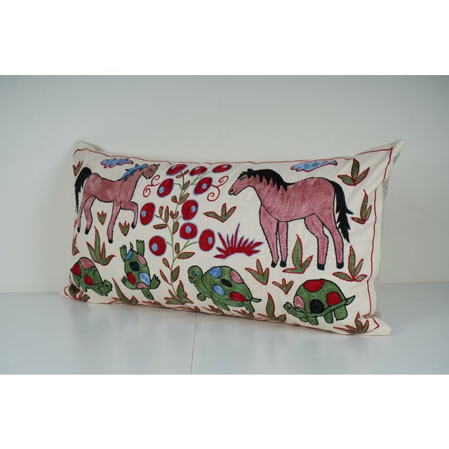 Uzbek Suzani Pillow Cover Elevate your home decor with our Turkish Suzani Pillow Cover, featuring exquisite vintage Uzbek...