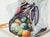 Fall still life with squash by Joseph Yeager (early-mid 20th Century) on heavy bond watercolor paper with ragged edges. No...