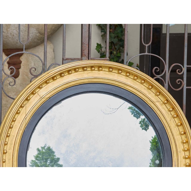 English Large 19th Century English Giltwood Convex Mirror With Ebonized Inner Trim For Sale - Image 3 of 10