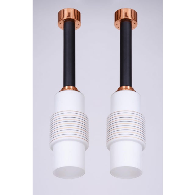 Maker: Drukov This sought-after pair of pendant lights from the 1950s, created in the workshops of the Czechoslovak...