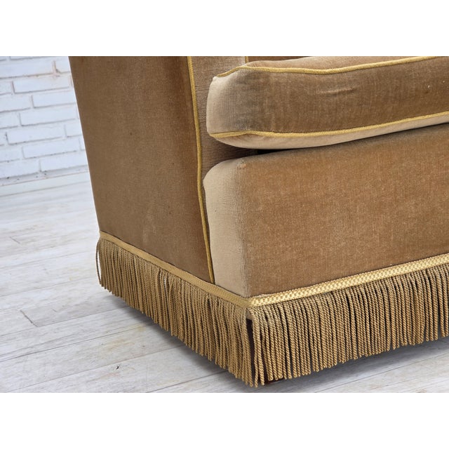 1970s, Danish armchair. Original honey yellow furniture velour, beech wood legs. Original good condition: no smells, no...