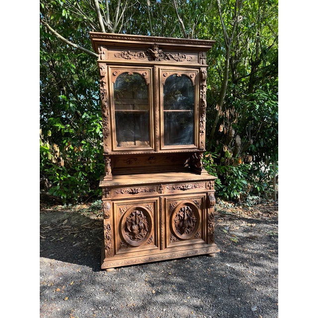A superb French Carved Oak Hunting Cabinet, dating to the mid 19th Century. Adorned with wonderful carvings including 2...