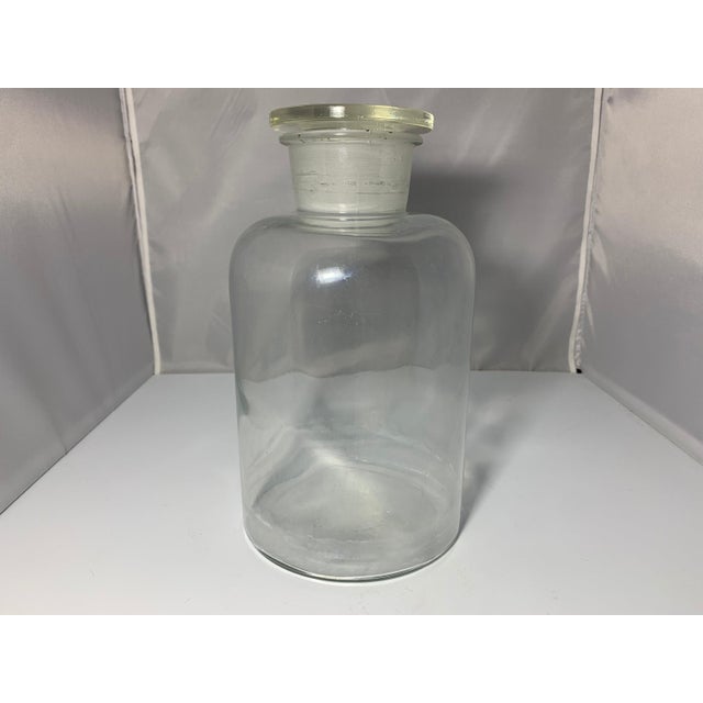 Large Millville Bottle Works Glass Stopper Jar for your consideration. The jar measures approx. 12 inches tall and approx....