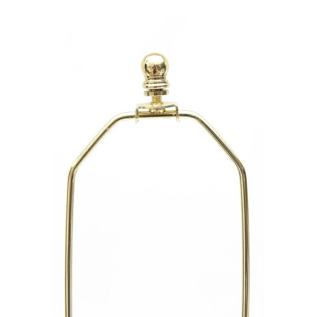 This wonderful pair of mid century modern table or console lamps have been attributed to the Laurel Lamp Co. They have...