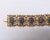 American Vintage 1994 Signed Napier Goldtone Black Oval Intaglio Link Bracelet For Sale - Image 3 of 7