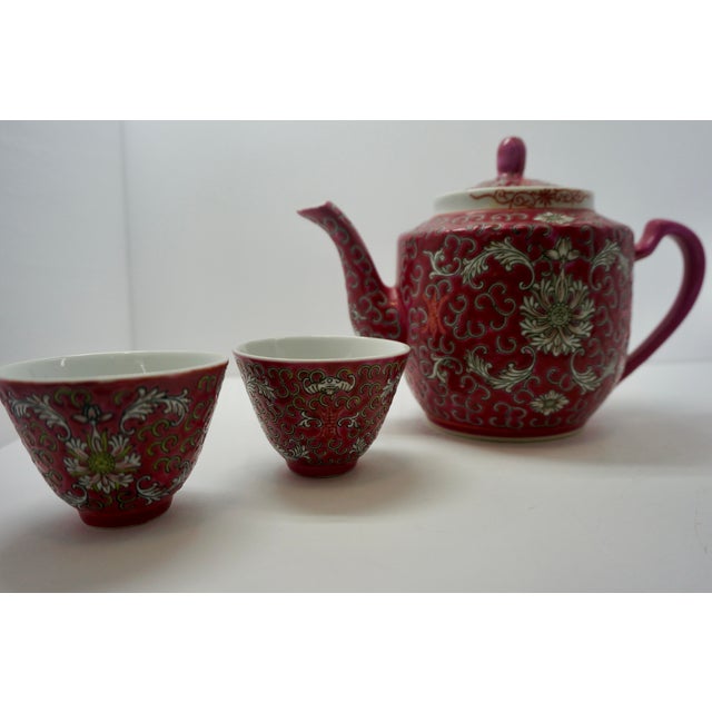 Bring a vibrant pop of color and historic symbolism to your table with this gorgeous, vintage 7-piece Chinese Famille Rose...
