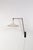 A rare ‘Panama’ wall lamp, designed by Wim Rietveld for Gispen in the 1950s. The lamp consists of a white lacquered...