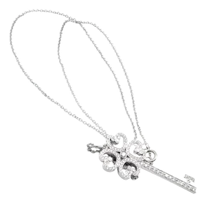 Edit Late 20th Century Tiffany & Co. Platinum & White Gold Enchant Quatra Heart Key Pendant Necklace