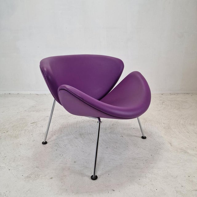 The famous Artifort orange slice chair by Pierre Paulin, designed in the 60s. This original chair with chromed legs is...