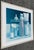 Monochromatic, blue-toned framed print of "Still Life with Straws" (1978) by the prominent American photorealist artist...