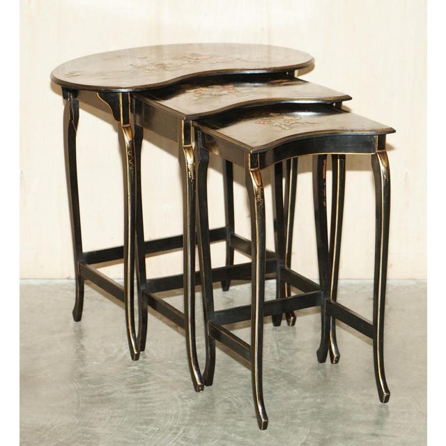 We are delighted to offer for sale this lovely nest of three original Chinese Chinoiserie black lacquered tables. A good...